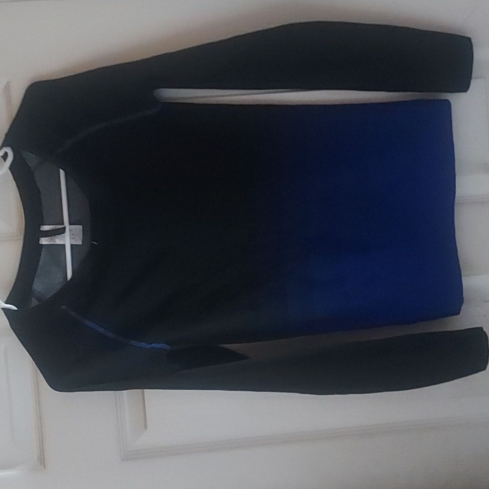 Long sleeved action wear top never worn